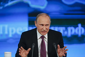 Russian President Vladimir Putin attends his annual end-of-year news conference in Moscow