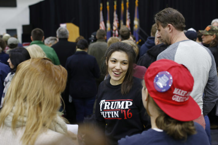 A woman wears a shirt reading "Trump-Putin '16" before a rally for Republican presidential candidate Donald Trump at Plymouth State University, February 7, 2016, in Plymouth, New Hampshire. / AFP / DOMINICK REUTER        (Photo credit should read DOMINICK REUTER/AFP/Getty Images)