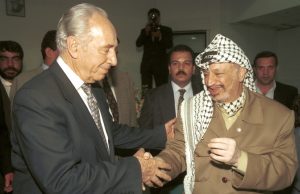 **FILE** Israeli president Shimon Peres meets with late Palestinian president Yasser Arafat in Muqata'a, the president's headquarters in the West Bank city of Ramallah. May 14, 1997. Photo by Flash90 *** Local Caption *** ????? ??? ??????? ?? ???? ????? ???????? ????????? ??????? ???????? ???????? ????????? ??????? ???????? ??????? ???????? ??????? ???????? ???????? ????????? ???????? ????????? ???????? ????????? ???????? ??????? ???????? ??????? ????????? ????????