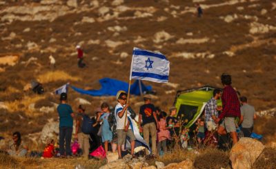 Settlers of the Nachala Settlement Movement set up tents near Kiryat Arba, with the intention to establish illegal outposts in Judea and Samaria,  at the Gush Etzion junction. July 20, 2022. Photo by Yonatan Sindel/FLASH90  *** Local Caption *** ???????
??? ?????
??????
???? ????